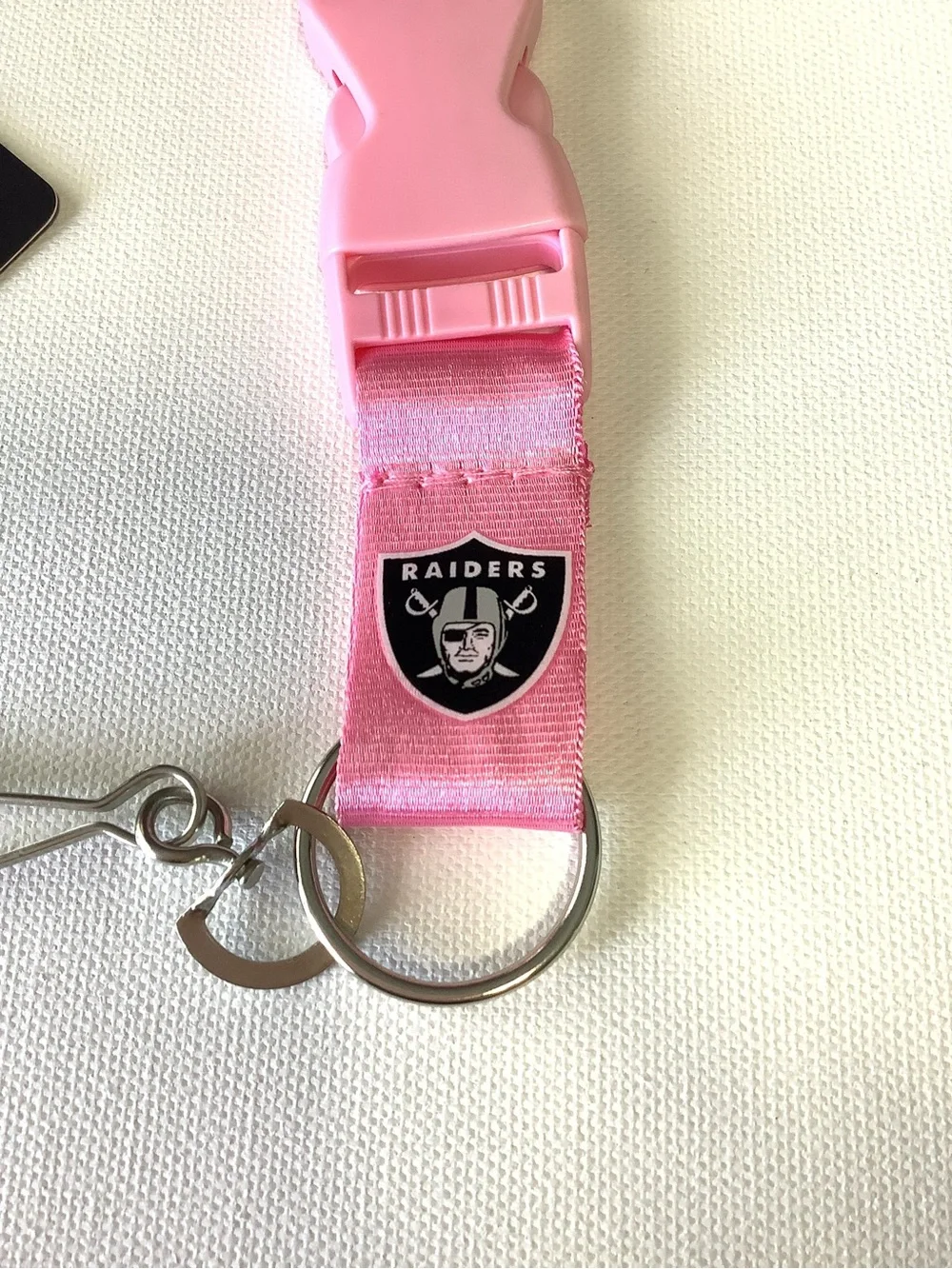 NFL Las Vegas Raiders Logo on Pink w/Black Lettering 24